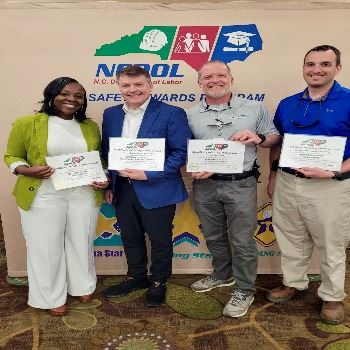 Beaufort County employees pose with the awards they received at a recent luncheon.